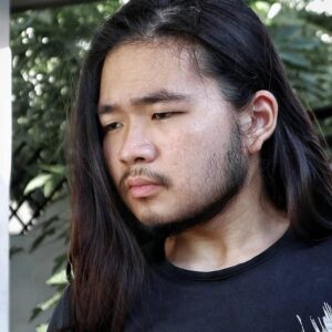 Asian with short, sparse beard